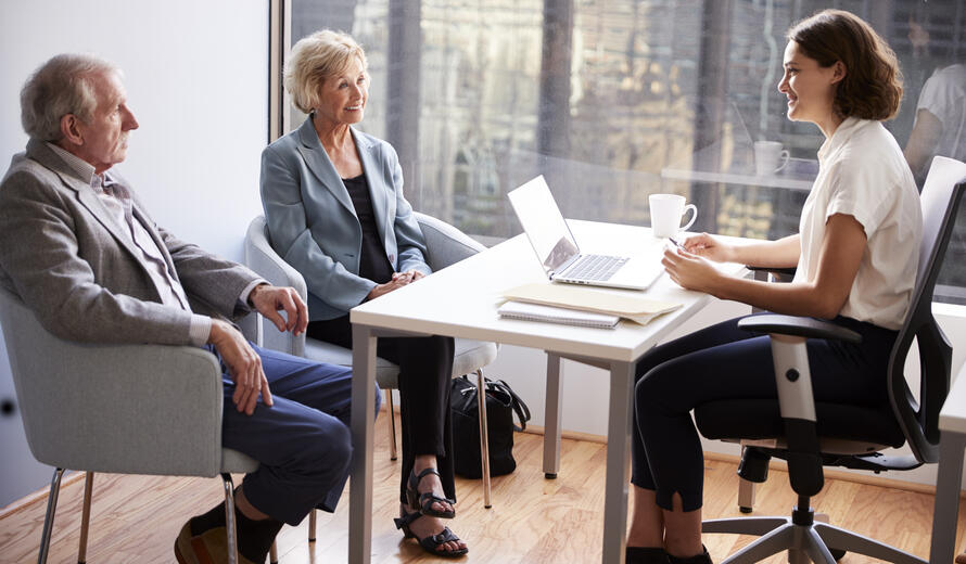 three people talking