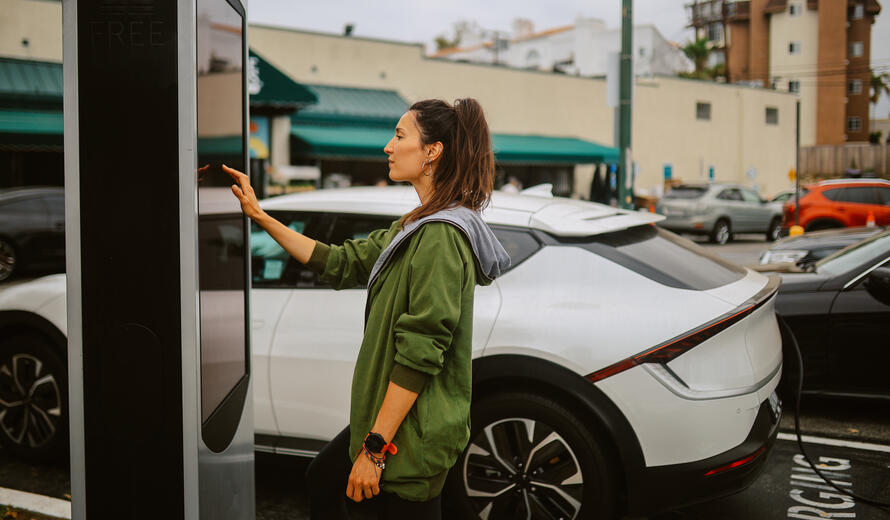 woman charging car