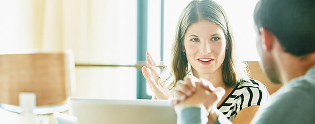 woman and a man talking