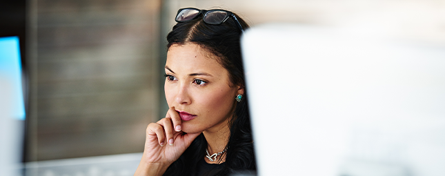 Woman analyzing computer data